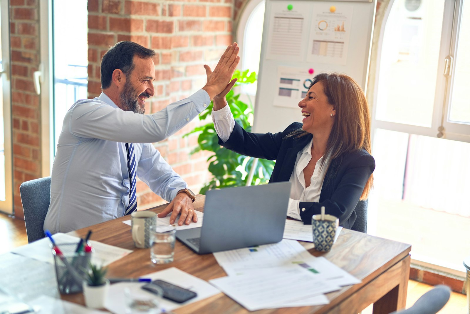 Office team using enterprise management software